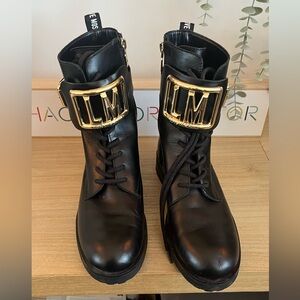 Black Leather Ankle Boots with Gold Accents